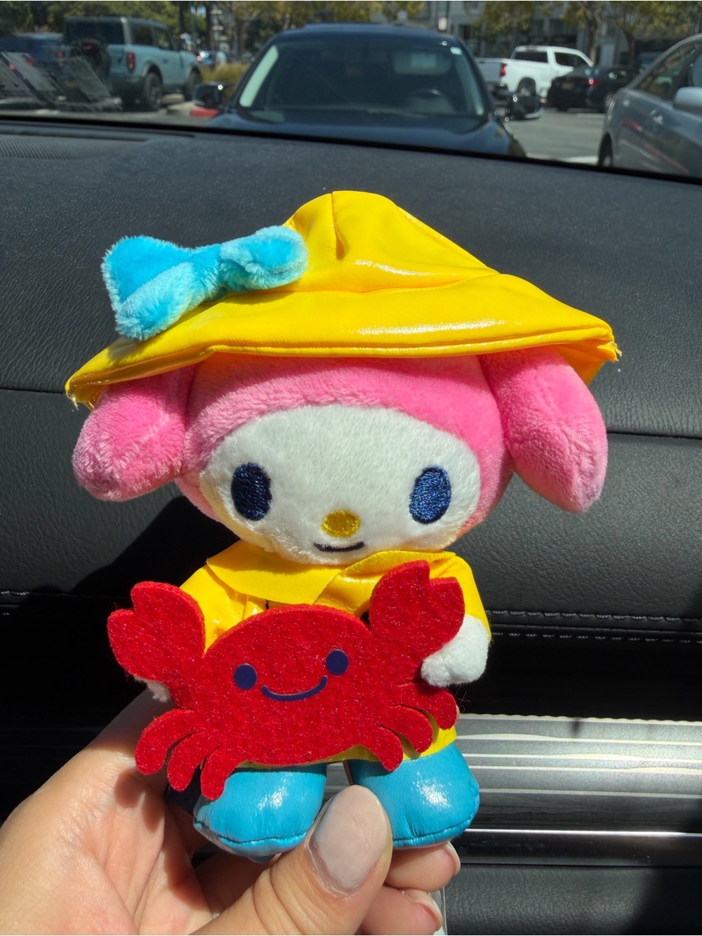 Sanrio My Melody Plush in Pink with Yellow Raincoat, Blue Bow and Red Crab